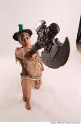 ANISE KNEELING POSE WITH AX 